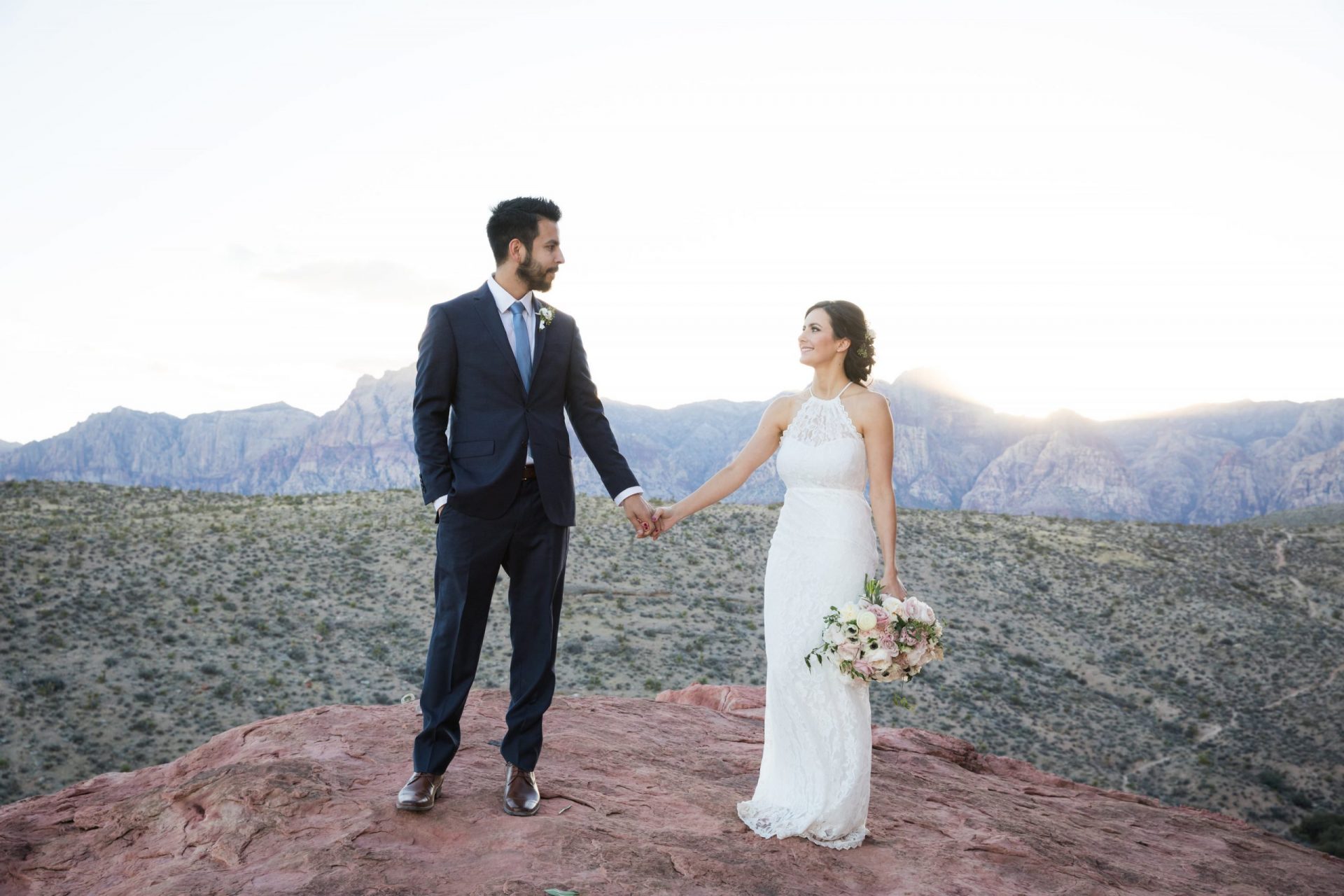 couple taking beautiful wedding photo outdoors