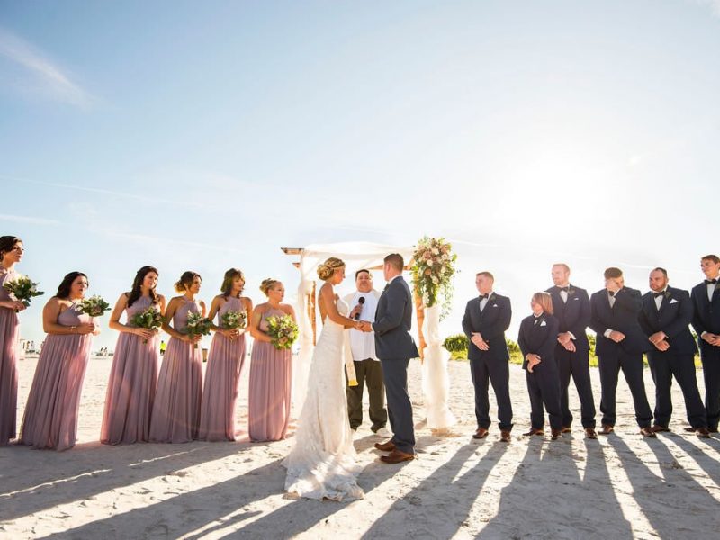 stunning bridal party and bride groom wedding photo beach