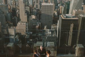couple having elopement ceremony at top of the rock nyc