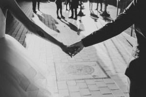 couple holding hands after getting married