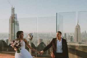 couple eloping at the top of the rock in nyc