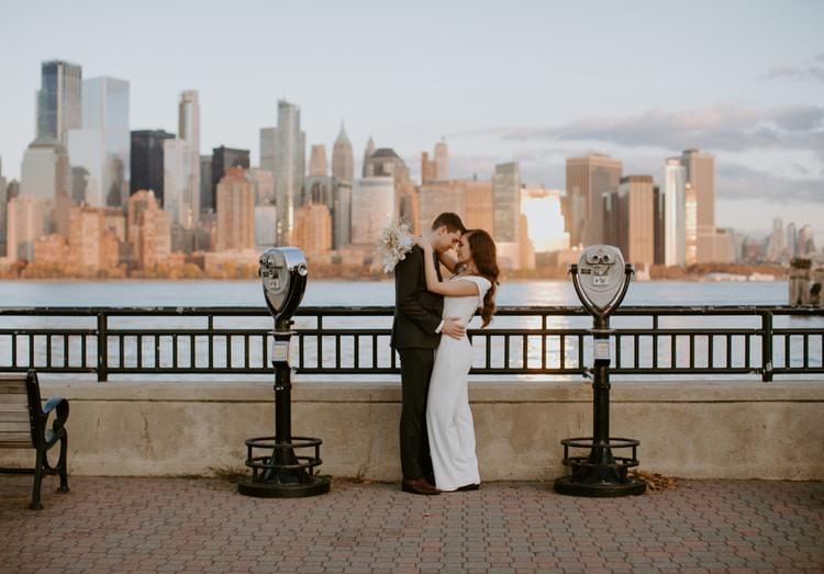 couple eloping with NYC in background