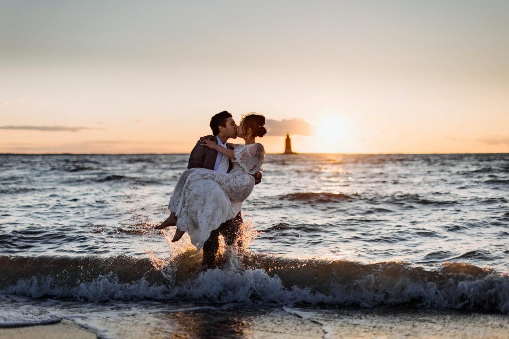 Couple recently eloped in Delaware by Lewes Beach