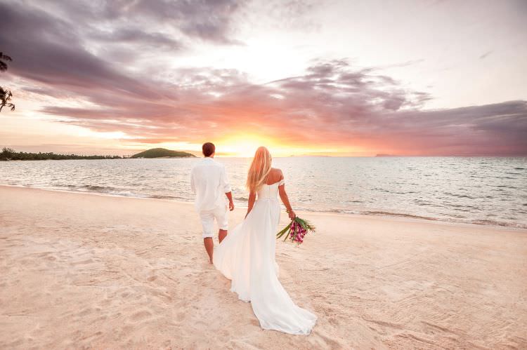Couple on beach in Jamaica after getting married